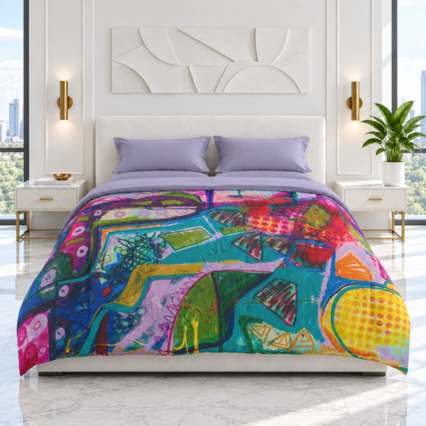 A Vibrant Life 1 comforter in the recreated white luxury room with gray-lavender pillows and sheets