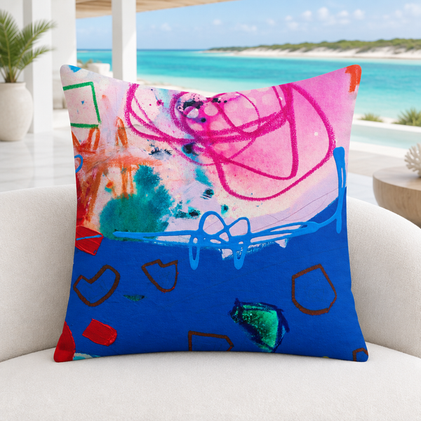 A Vibrant Life 4-b pillow in a modern cool-white Turks and Caicos villa