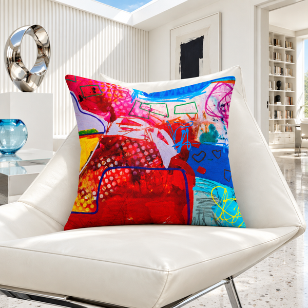 A Vibrant Life pillow in a cool bright-white gallery room