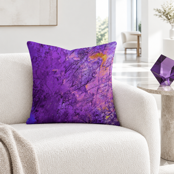 Amethyst pillow in a modern white living room with a geometric glass sculpture