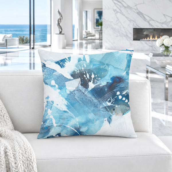 Aquatic Blue Waters pillow in a cool-white great room with marble fireplace