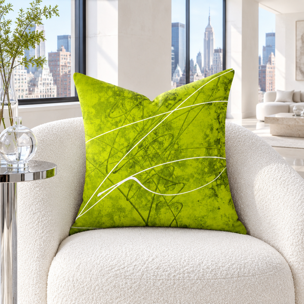 Chartreuse pillow in a cool-white city loft