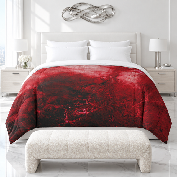 Crimson comforter in a luxurious marble suite with a plush bench and silver sculpture