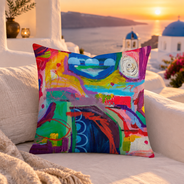 Destination Happiness pillow close-up in a Santorini suite at sunset
