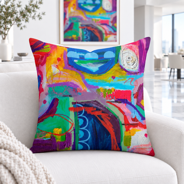 Destination Happiness pillow close-up in a white loft with matching wall art