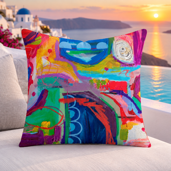 Destination Happiness pillow upright on a Santorini terrace at sunset