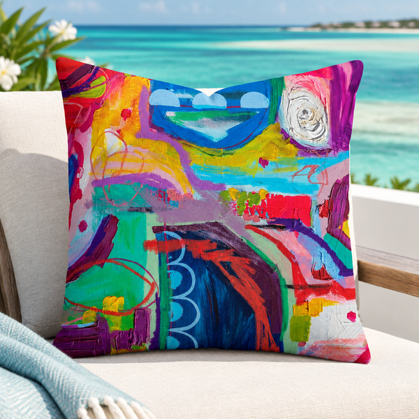 Destination Happiness pillow upright on a Turks and Caicos terrace
