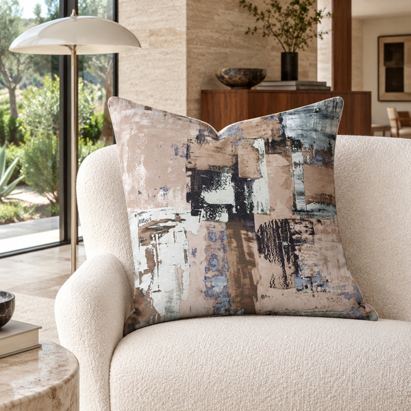 Earthy 22 x 22 pillow slouched on an ivory chair in a California modernist home