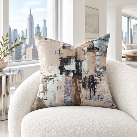 Earthy pillow in a cool-white city penthouse