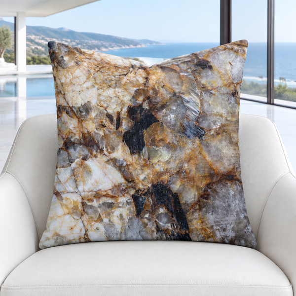 Granite pillow close-up on a sculptural white chair in Malibu