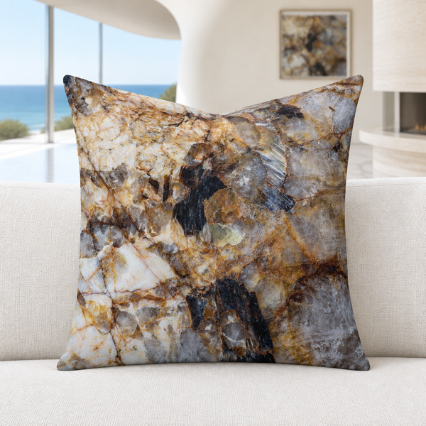 Granite pillow in a modern Malibu room with softly blurred matching artwork