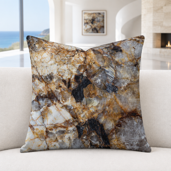Granite pillow in a modern Malibu room with softly blurred matching artwork