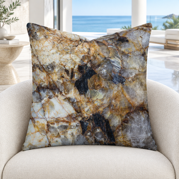 Granite pillow on a contemporary white chair in a Malibu gallery room