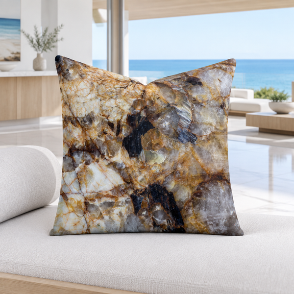 Granite pillow on a modern daybed in a bright white Malibu home
