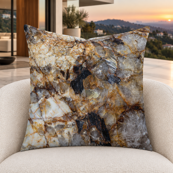 Granite pillow on an ivory lounge chair in a modern Hollywood Hills sunset room