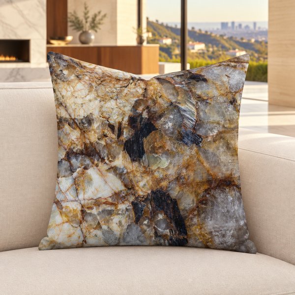 Granite pillow on an ivory sofa in a warm Hollywood Hills home