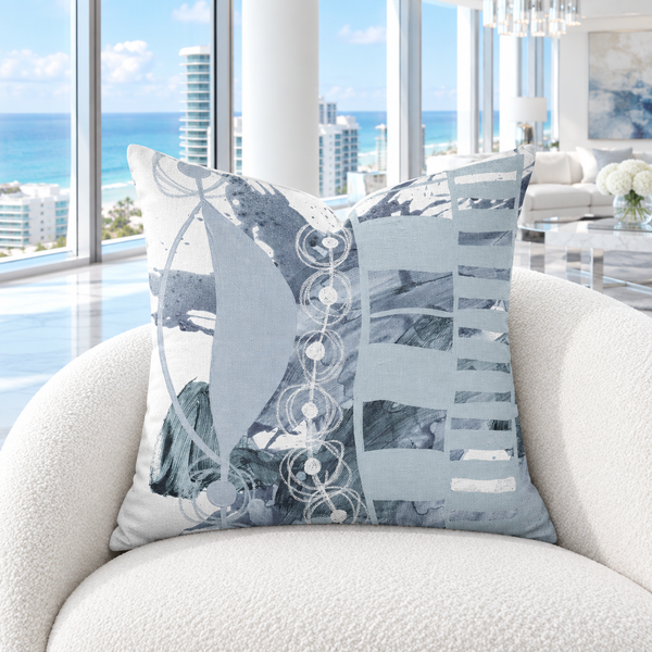 Gray pillow in a cool-white coastal penthouse