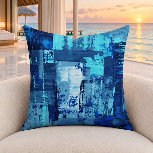Blue 7 pillow upright in a modern Maldives resort at an understated sunset