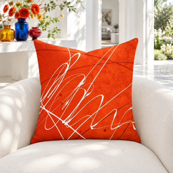 Vermillion pillow in white villa with colorful flowers and glass