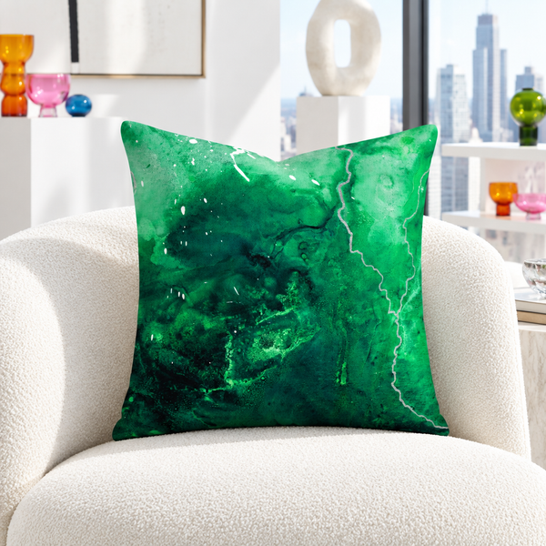 Green Energy 4 pillow in white collector room with colorful glass