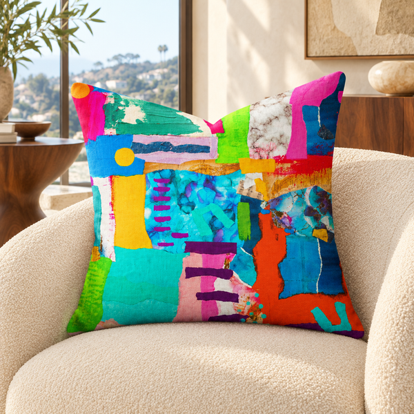 Symphony of Colors - 2 art pillow on an ivory chair in a Hollywood Hills home