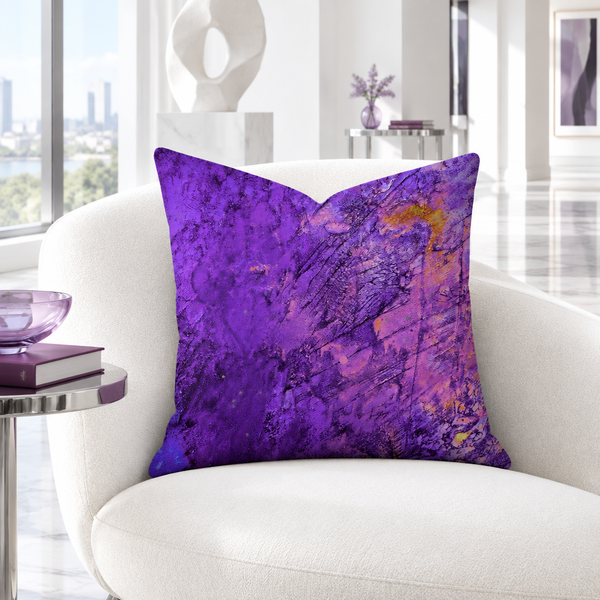 Amethyst art pillow on a white chair in a bright modern white room