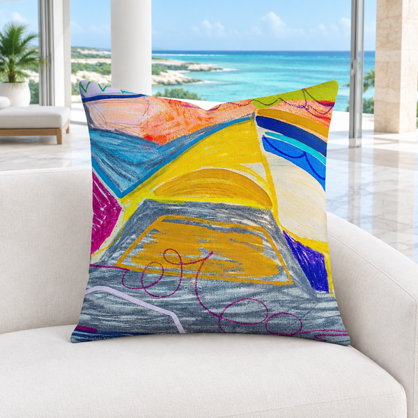 The A New Beginning 22-inch art pillow in a bright modern Turks and Caicos beachfront resort with cool-white marble floors and a natural turquoise lagoon