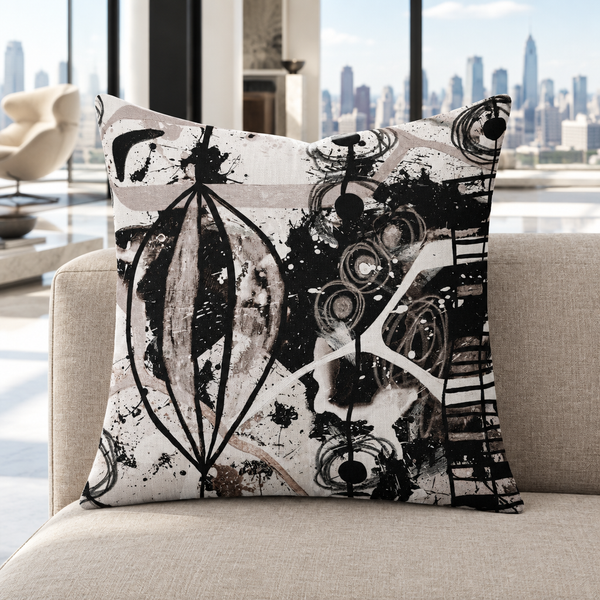 Modern Black White and Taupe pillow upright in a modern marble-floor resort penthouse with taupe and black details