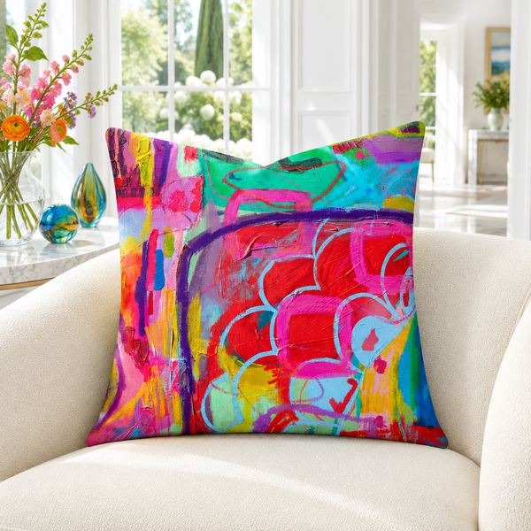 Destination Happiness 1 pillow in bright white garden villa with colorful flowers