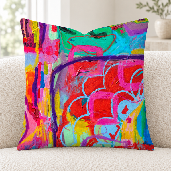 Close-up of the Destination-Happiness -1 square pillow in a bright modern white loft