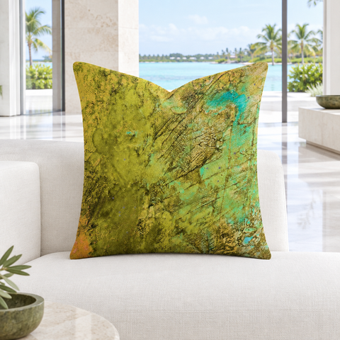Earthy Colors 22-inch art pillow upright in a cool-white modern resort suite with white marble flooring and a natural lagoon view
