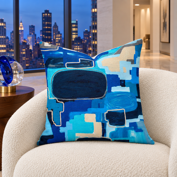 In the City 22-inch pillow in luxury penthouse at blue hour with city lights