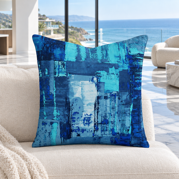 Blue 7 pillow upright in a cool-white Malibu coastal penthouse