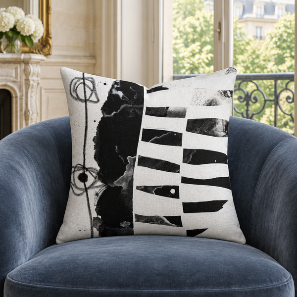 Modern Black White 2-1 pillow in Paris apartment on smoky-blue velvet chair
