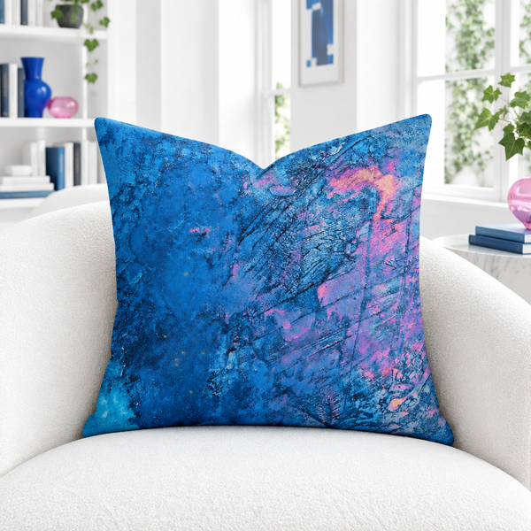 Beautiful Sky 22-inch pillow in white gallery room with matching blue and pink details
