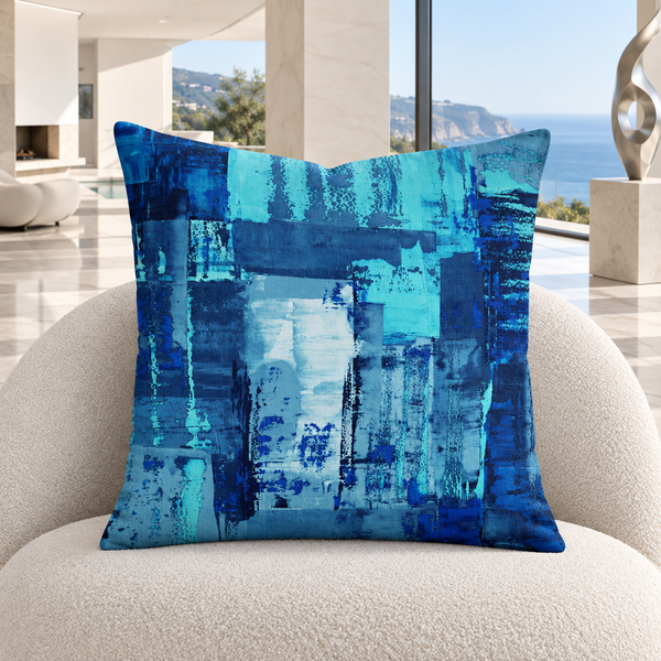Blue 7 pillow upright in a bright coastal gallery residence in Malibu