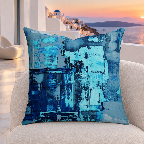 Blue 4 pillow upright in a contemporary Santorini suite at sunset