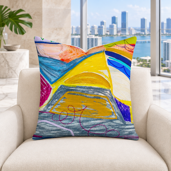The A New Beginning 22-inch art pillow upright in a bright Miami penthouse with a varied skyline and marble floors