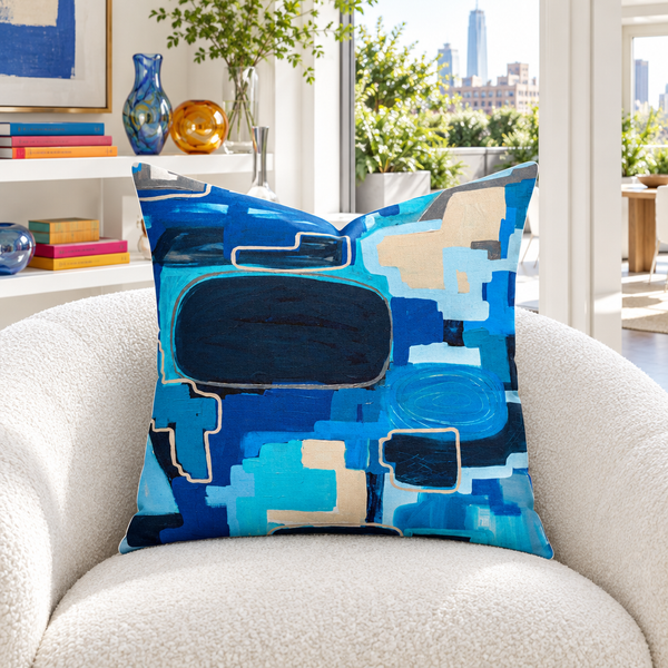 In the City 22-inch pillow in white sunroom with colorful details