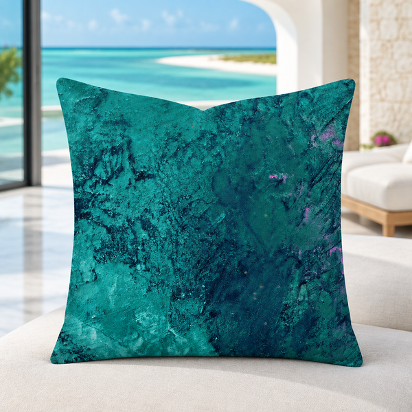 Teal pillow with two restrained color accents in a modern Turks and Caicos villa