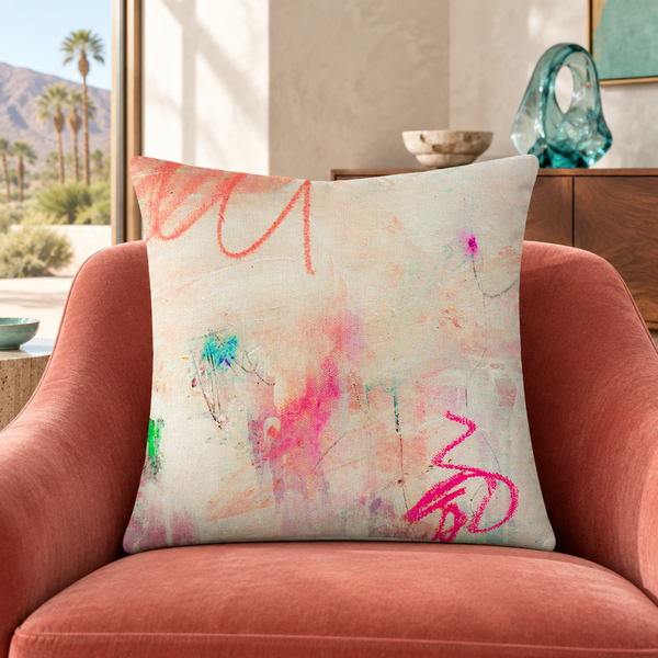 Tenderness pillow in coral chair Palm Springs collector room