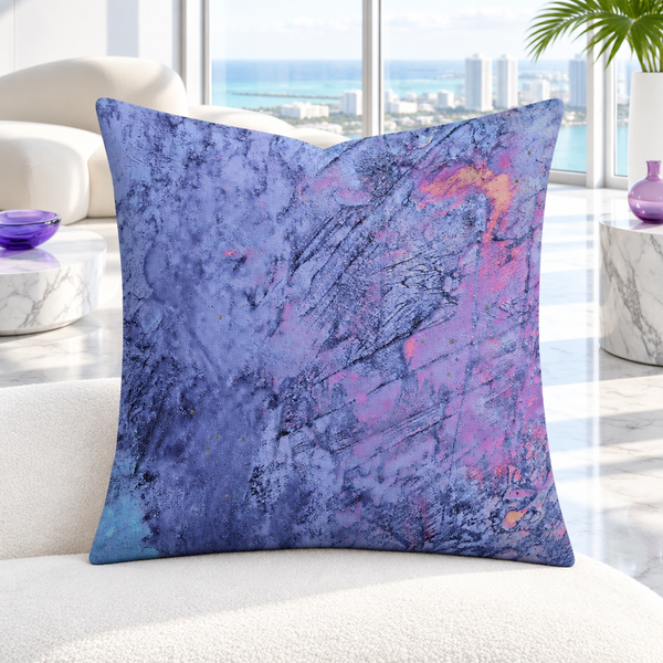 Sunrise pillow upright in a bright white modern Miami penthouse with restrained color accents matching the print