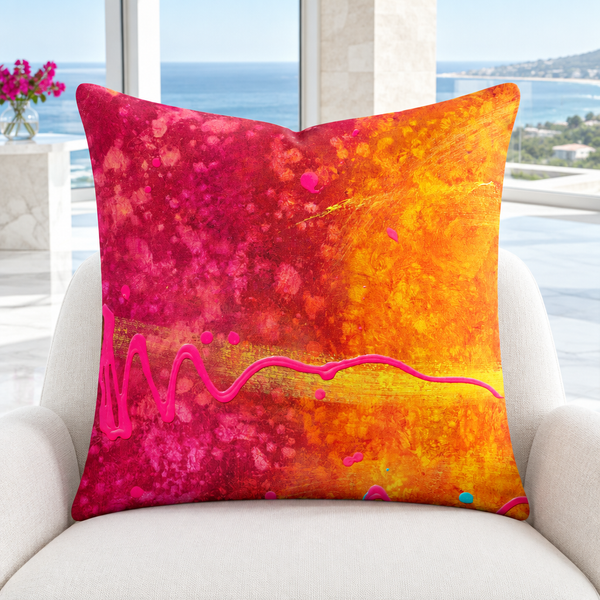 Summertime pink and orange 22-inch pillow upright in a bright-white modern Malibu room with white marble floor