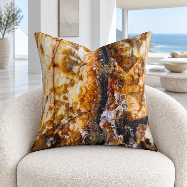 Rust Marble pillow close up in a cool white Malibu mansion
