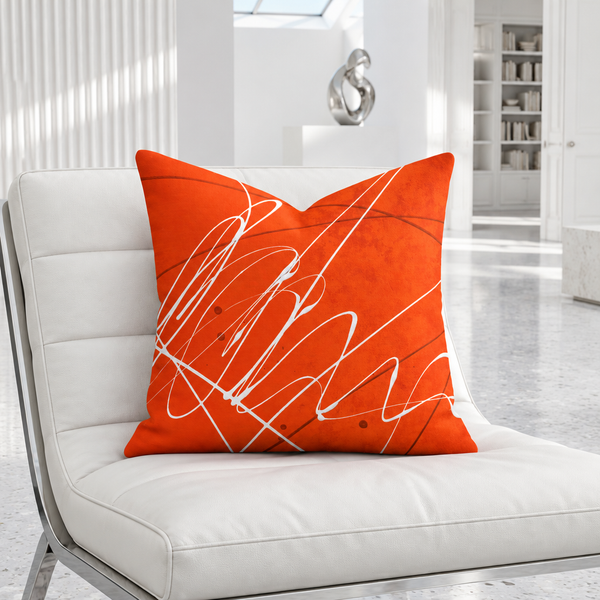 Vermillion art pillow in a cool bright white gallery room