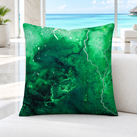 Green Energy 4 pillow upright in a sunlit white marble Maldives resort lounge