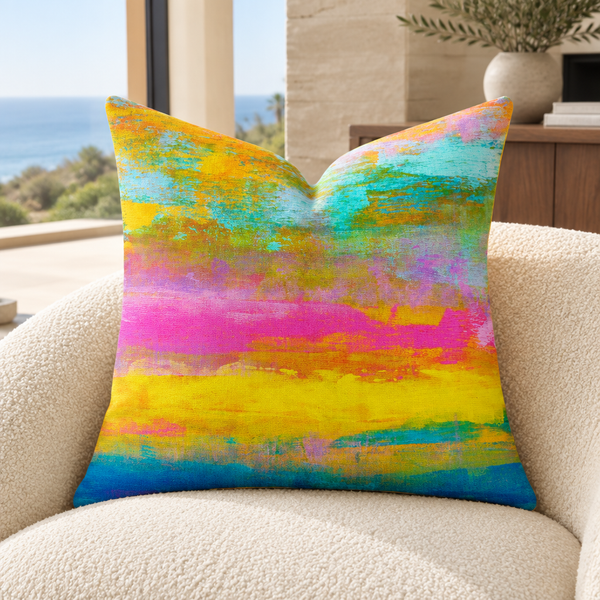 Opal art pillow on an ivory chair in a Malibu coastal home