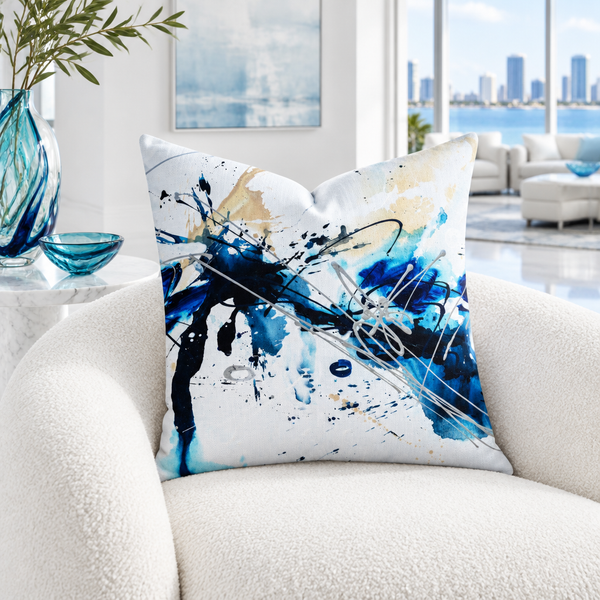 Nautical A pillow in a white waterfront room with matching blue glass details