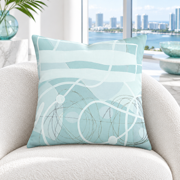 Neutral Laguna pillow in a bright white Miami penthouse