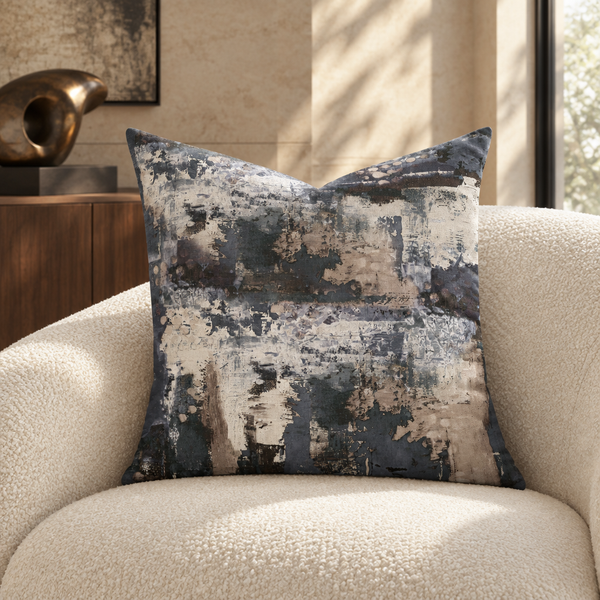 Perspective art pillow on an ivory chair in a luxury art collector's suite